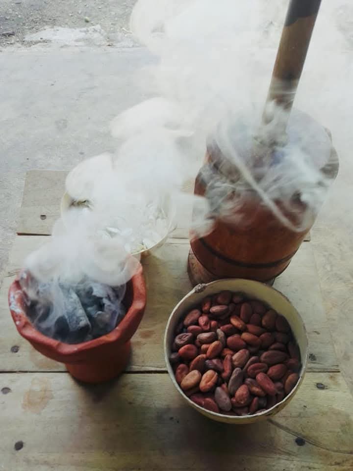 smoke billowing from cacoa beans